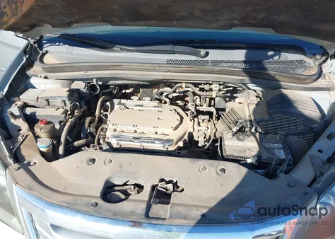 2010 Honda Odyssey Ex-L z USA, uszkodzony, nr VIN 5FNRL3H70AB029048